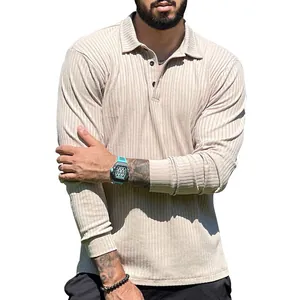 Detail view of men's long-sleeve polo shirt featuring a textured ribbed fabric finish