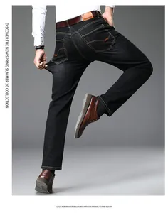 Detail view of men's high-stretch black straight-leg jeans with flexible fit.