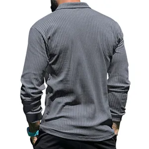 Back view detail of men's grey ribbed long sleeve polo shirt showing fabric texture