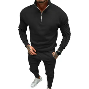Men's black thermal tracksuit set with quarter-zip sweatshirt and joggers
