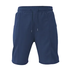 Dettaglio dei pantaloncini blu scuro in maglia a nido d'ape con coulisse da uomo