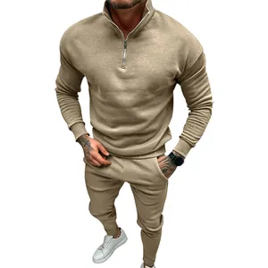 Full body view of khaki men's fleece tracksuit set with half-zip sweatshirt and joggers.