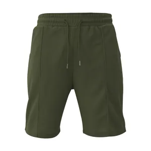 Vista dettagliata dei pantaloncini da uomo in maglia waffle oliva con coulisse in vita
