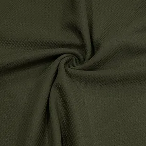 Primo piano della trama del tessuto a nido d'ape verde oliva scuro per polo