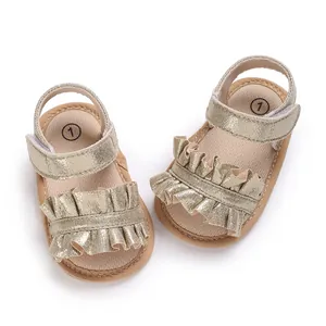 Elegant gold ruffled infant girl sandals with comfortable soft non-slip sole for walking