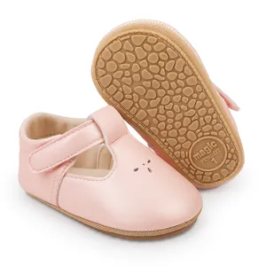 Detailed view of pink infant princess walking shoes featuring soft anti-slip rubber sole