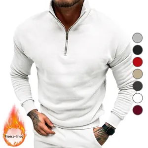 Detail view of white fleece-lined men's sweatshirt with half-zipper polo collar
