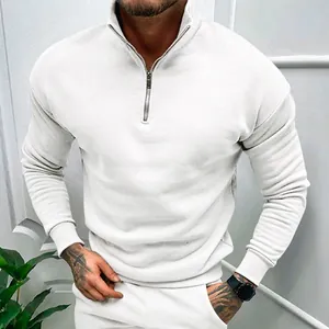 Close-up of men's white half-zip sweatshirt with a stand collar and ribbed cuffs