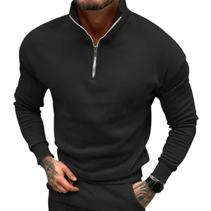 Detailed view of men's black fleece long-sleeve sweatshirt with a sleek half-zip stand collar