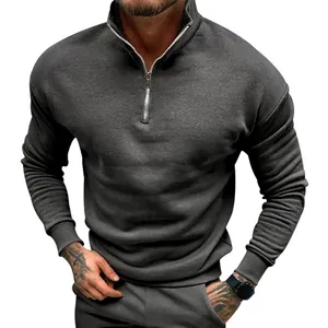 Detailed view of a men's dark gray half-zip fleece sweatshirt with stand collar