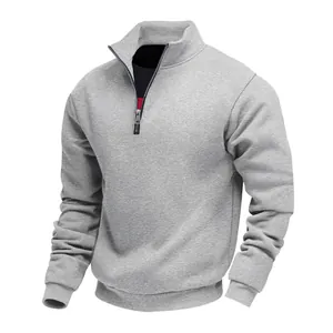 Felpa da uomo in pile grigio con mezza zip, polsini e orlo a costine per l'inverno.