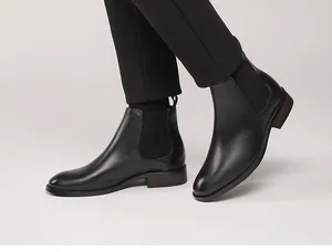 Classic black leather Chelsea boots for men with elastic side panels and low heel