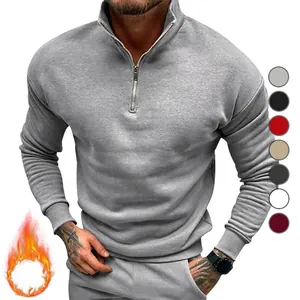 Warm grey men's fleece-lined sweatshirt featuring half-zip polo neck and long sleeves
