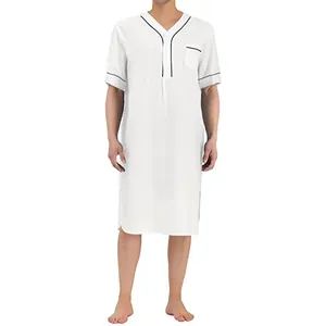 Close-up of men's white mid-length nightshirt with black trim and chest pocket detail