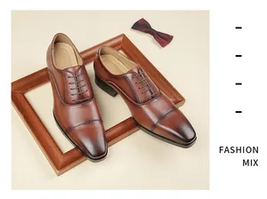 Detailed view of brown leather Derby shoes displayed on a wooden frame with a bow tie