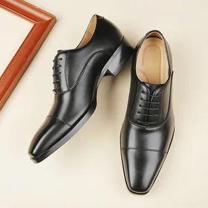 Classic black men's business dress shoes with elegant cap-toe and lace-up design
