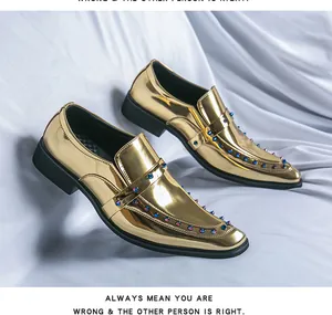 Detail view of metallic gold loafers with colorful stud embellishments and pointed toe.