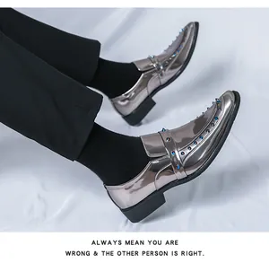 Metallic silver patent leather loafers featuring colorful rivets and pointed toe