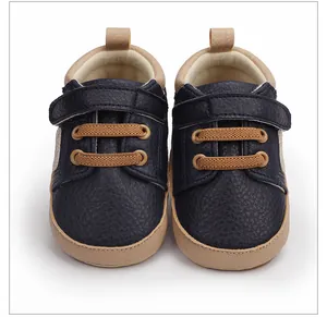 Zapatos de aprendizaje para bebé en cuero sintético azul marino con suela blanda y velcro