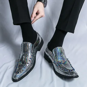 Holographic snakeskin loafers with pointed toe and colorful metal studs decoration