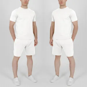 Detail view showing the overall fit of the white T-shirt and matching shorts set.