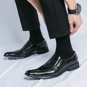 Men's black glossy embossed crocodile leather loafers featuring a stylish pointed toe design