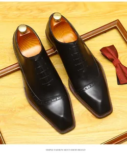 Premium black leather brogue Oxford shoes for men featuring elegant wingtip detailing