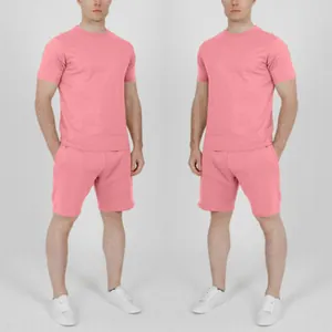 Full view of men's minimalist pink casual summer t-shirt and shorts set on model