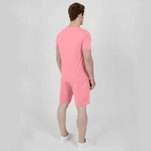 Back view of pink men's summer sports suit with short sleeves and matching shorts