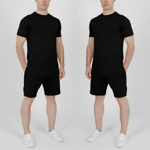 Dual view presentation of a classic men's black cotton blend sports t-shirt and shorts set.