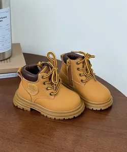 Bottines Martin jaunes durables pour enfants avec semelles souples et fermetures éclair latérales
