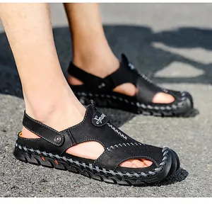 Detailed shot of breathable men's hollow leather sandals for outdoor casual wear.