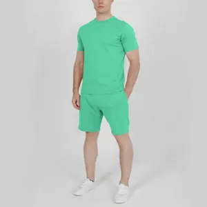 Full view of men's mint green short sleeve t-shirt and matching shorts athletic set