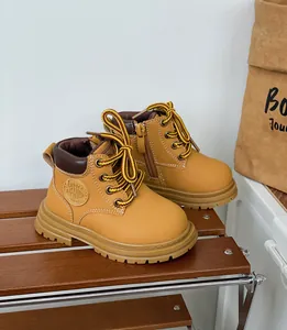 Bottines Martin jaunes pour enfants avec fermeture éclair latérale et semelle en gomme