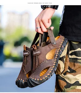 Premium brown leather men's sandals with breathable cut-out design and handmade stitching