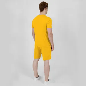 Back view showing the fit of men's bright yellow casual t-shirt and shorts sports set