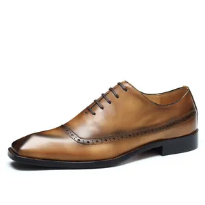 Elegant brown leather Brogue Oxford shoes with hand-burnished wingtip carving for men