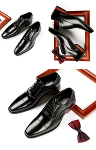 Detailed view of black leather cap-toe Oxford shoes for formal business or weddings.