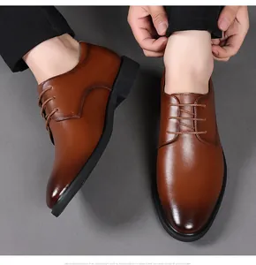 Top-down view of men's brown business leather shoes with a smooth gradient finish.