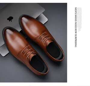Close-up top-down view of premium brown leather men's formal business dress shoes