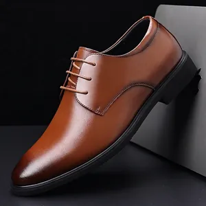 Classic brown leather business oxfords for men in a minimalist studio setting