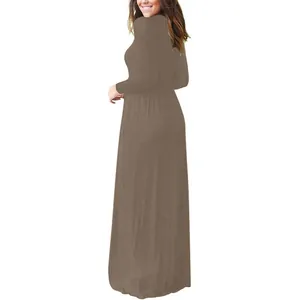 Back view of a brown long sleeve maxi dress with pockets showing its elegant draped fit