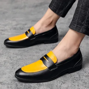 Stylish yellow and black color-block men's pointed-toe leather dress shoes for formal wear