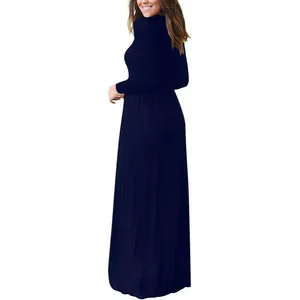 Side profile view of a long-sleeved navy blue crew neck floor-length pocket maxi dress