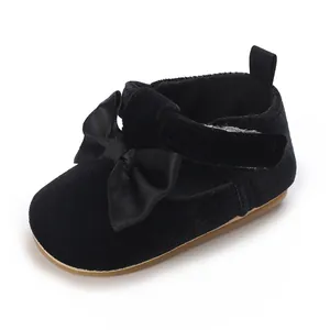 Elegant black velvet baby pre-walker shoe with soft sole and cute bow detail design