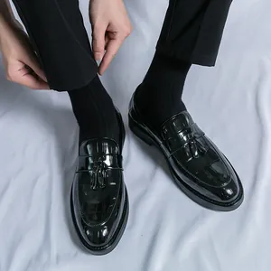Men's black patent leather tassel loafers with embossed crocodile pattern British style