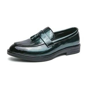 Stylish men's dark green glossy patent leather loafers with elegant tassel and grid texture