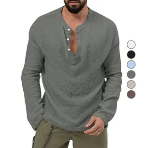 Close-up of casual men's long sleeve seersucker shirt in grey featuring a buttoned placket.