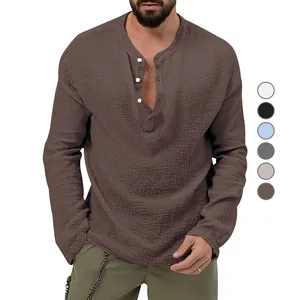 Casual long-sleeved brown seersucker shirt for men featuring a buttoned Henley neck.