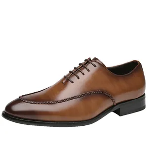 Elegant men's brown leather Oxford dress shoes featuring vintage braided texture detail